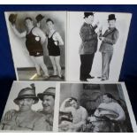 Entertainment, Laurel & Hardy, four 30cm x 40cm b/w reproduction film stills, 3 in clip frames (