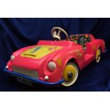 Toys, Tri-ang Carnaby Pedal Car, pink body, yellow bonnet, boot and hubs, registration CHE 4531,