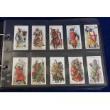 Cigarette cards, Player's, a modern album containing 8 Military and Naval related sets inc. Life