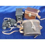 Camera/binoculars, a vintage Kodak Coronet camera in leather case, together with a pair of vintage