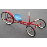 Tri-ang Toys Hand-Powered Recumbent Trike, red body with blue seat, white rubber handles, 105cm in