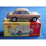 A Dinky Toys 144 Volkswagen 1500, metallic bronze body, blue interior, spun hubs, in original box (