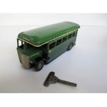 A Tri-ang Minic 53M Green Line Single Decker Bus, two tone green tinplate body, clockwork motor,