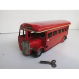 A Tri-ang Minic 53M London Transport Single Decker Bus, red tinplate body, clockwork motor, bare