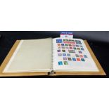 Stamp album containing Commonwealth and International stamps, Victoria to mid-20th Century inc. Hong