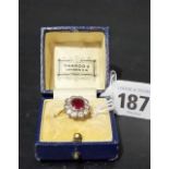 Good Edwardian gold and platinum mounted diamond and ruby cluster ring, the ten brilliant cut