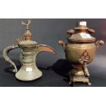 Small Persian brass foliate engraved urn; together with an Eastern small metal ewer (2).