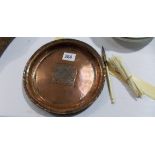 Hugh or Brian Wallis copper pewter inlaid circular tray; together with a small collection of ivory.