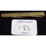 9ct gold engine turned tie clip, weight 6.3g approx.