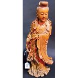 Good Chinese boxwood carved figure of Guan Yin holding beads in her right hand, her hair with