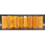 Pair of Japanese bamboo six fold miniature screens, each carved with calligraphy to the ends and