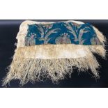 Blue metal embroidered silk shawl with foliate decoration together with a cream silk shawl with