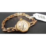 9ct rose gold ladies manual wind wristwatch, the cream dial with Arabic numerals and mother of pearl