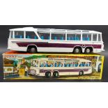 A Dinky toys 952 Vega Major luxury coach, white painted with blue interior, with Meccano receipt and