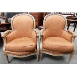Pair of Louis XVI style French beech framed upholstered armchairs.