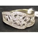 Art Deco 14k diamond cluster ring, of pierced scroll design with small diamonds, stamped '14k OJ',