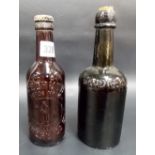 Advertising Redruth Brewery Co. Ltd. brown glass beer bottle with original contents; together with a