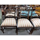 George III mahogany set of four ladder back dining chairs with drop in upholstered seats and