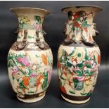 Pair of 20th Century Chinese pottery crackle glazed vases, applied with Fo dog lugs and painted in