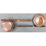 Two 19th Century copper bedwarming pans.