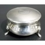 Silver circular trinket box, the hinged lid engine turned and engraved 'Pamela', raised on three