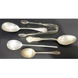 Four various silver spoons; together with a pair of silver sugar tongs, weight 3.25oz approx (5).
