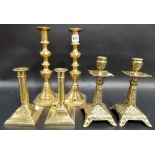 3 pairs of brass candlesticks