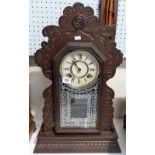 American Ansonia gingerbread mantel clock, height 22.75'.