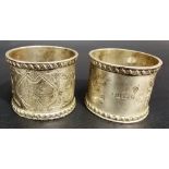 Pair of Edwardian silver foliate engraved napkin rings with gadrooned borders, Birmingham 1902,