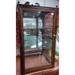 Mahogany glazed tabletop display case, the top with pierced swan neck gallery with urn finials,