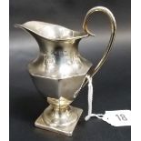 Victorian silver pedestal octagonal section cream jug with square foot, Birmingham 1887, weight