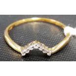 9ct gold chip diamond 7 stone wishbone ring, weight 1.1g approx