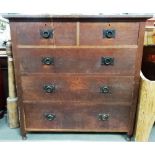Oak Arts and Crafts chest of two short over three long drawers upon turned feet, possibly by Ambrose
