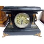 Ebonised simulated slate and marble two train mantel clock, width 15'.