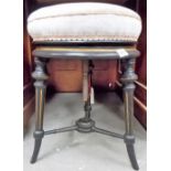 Victorian ebonised and gilt painted circular adjustable piano stool.