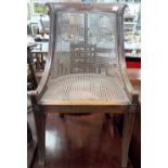 19th Century painted simulated rosewood bergere chair (cane work af).