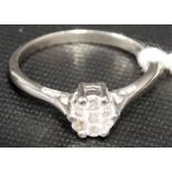 9ct white gold seven stone diamond cluster ring, each diamond of 0.05ct spread approx., weight 2.1