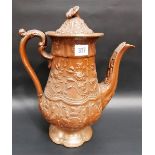 19th Century salt glazed relief moulded large teapot, decorated with foliate relief panels with a