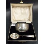 Silver Christening bowl of plain form with associated spoon within fitted case, the bowl