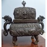 Chinese bronze censer, of rectangular section, the lid profusely foliate scroll cast, the body