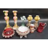 Collection of Victorian and later coloured glass including two pairs of candlesticks, a cranberry