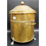 Brass circular lidded coal bin raised on triple paw feet