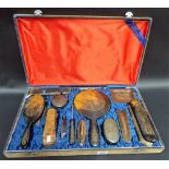 Oriental Pre-War tortoiseshell 12 piece dressing table set, each gilt tooled decorated with writhing