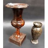 Cornish red serpentine slender pedestal vase upon a square foot (rim AF), height 8.5'; together with