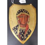 Eastern European lacquered & painted brass shield shaped icon, decorated with the bust of a female