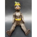 Antique painted papier mache small doll depicting an ethnic African tribal gentleman, height 6'.