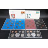 Six Commonwealth coin proof sets inc. 2 New Zealand sets; together with an album of Papua New Guinea