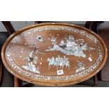 Chinese hardwood mother of pearl inlaid oval tray, inlaid with three gentlemen on horseback within a