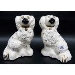 Pair of Royal Doulton Victorian Staffordshire Pottery style Spaniel figures, height 8'.