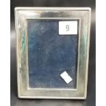 Contemporary silver rectangular photograph frame, Sheffield 1996, 6.5' x 5' overall.